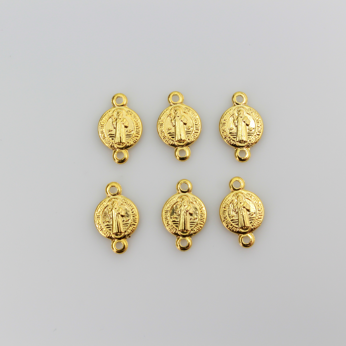 Saint Benedict Medal round flat connector links that are a shiny gold color and are handcrafted in Italy