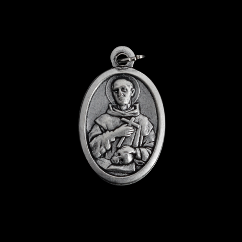 Saint Bruno of Cologne medal that depicts the saint with a skull on the front and is marked "Pray For Us" on the back
