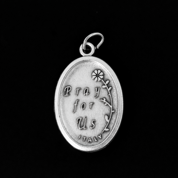 Saint Joseph oval medal that depicts the saint on the front and "Pray For Us" on the back