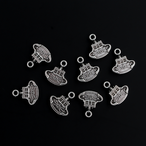 Small charm depicting Saint Peter's Basilica and Saint Peter's Square in Vatican City Rome. These are double sided charms and look the same on both sides