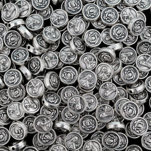 St. Therese of Lisieux metal beads with a rose on the backside. These round, flat beads are silver oxidized base metal and are handcrafted in Italy