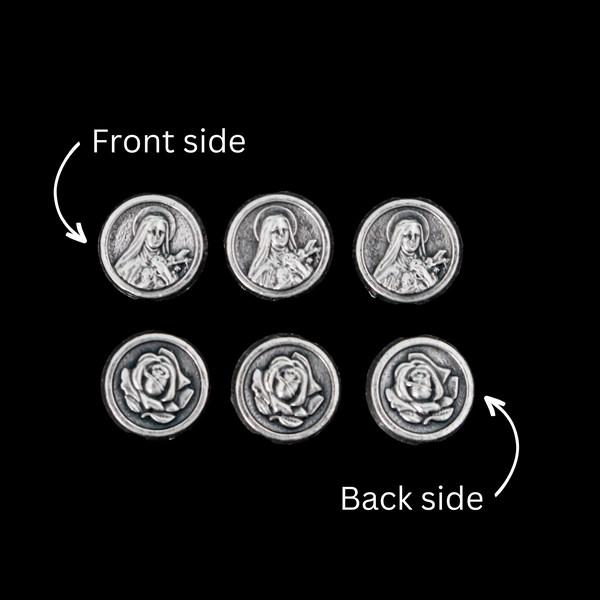 St. Therese of Lisieux metal beads with a rose on the backside. These round, flat beads are silver oxidized base metal and are handcrafted in Italy