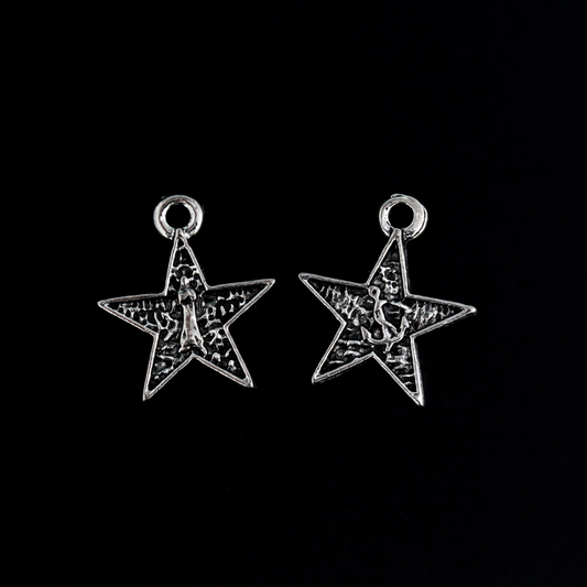 Small star-shaped charms that feature The Blessed Virgin Mary as Our Lady of the Sea on the front side and an anchor on the backside.