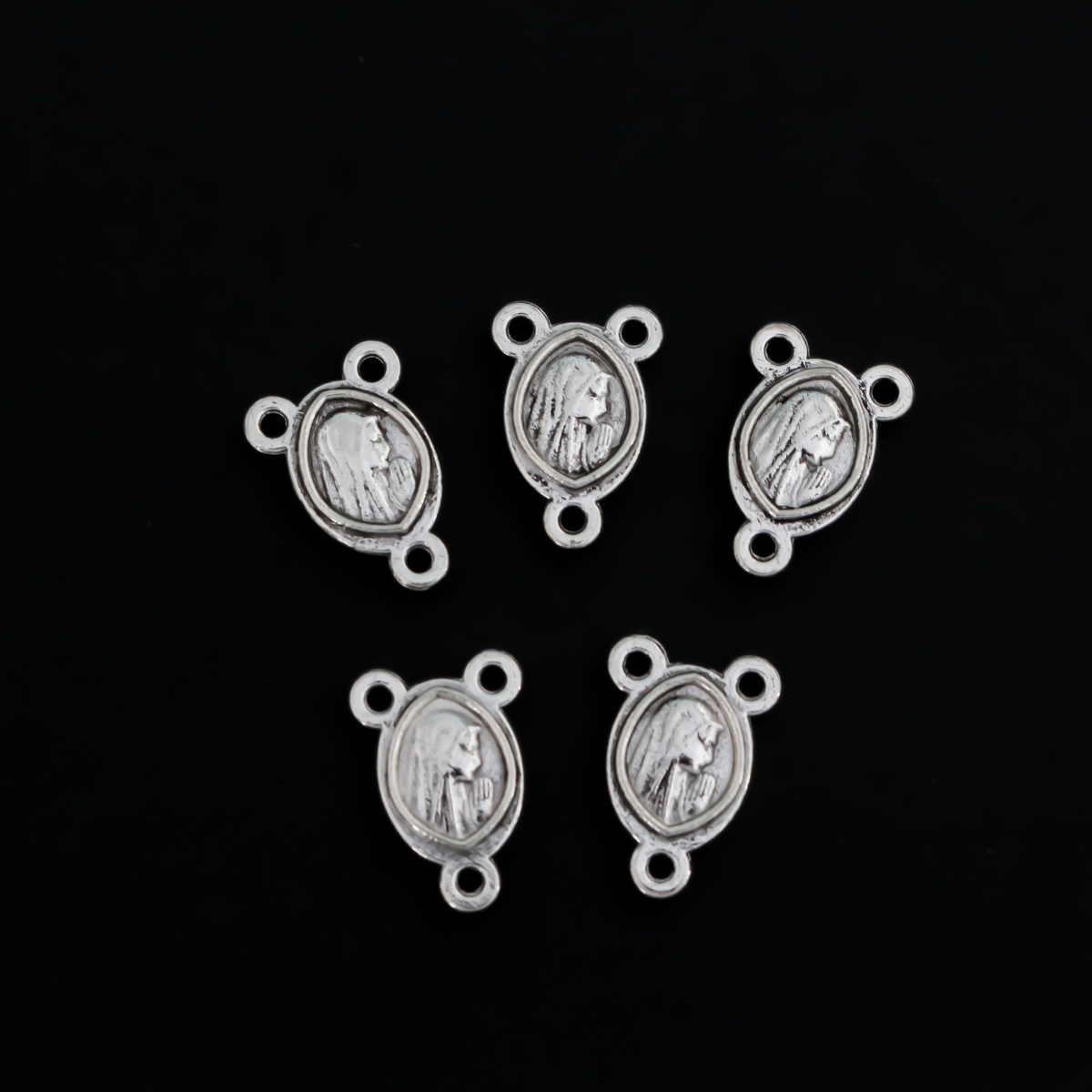 Tiny Our Lady of Fatima rosary centerpiece with the Blessed Virgin Mary on the backside