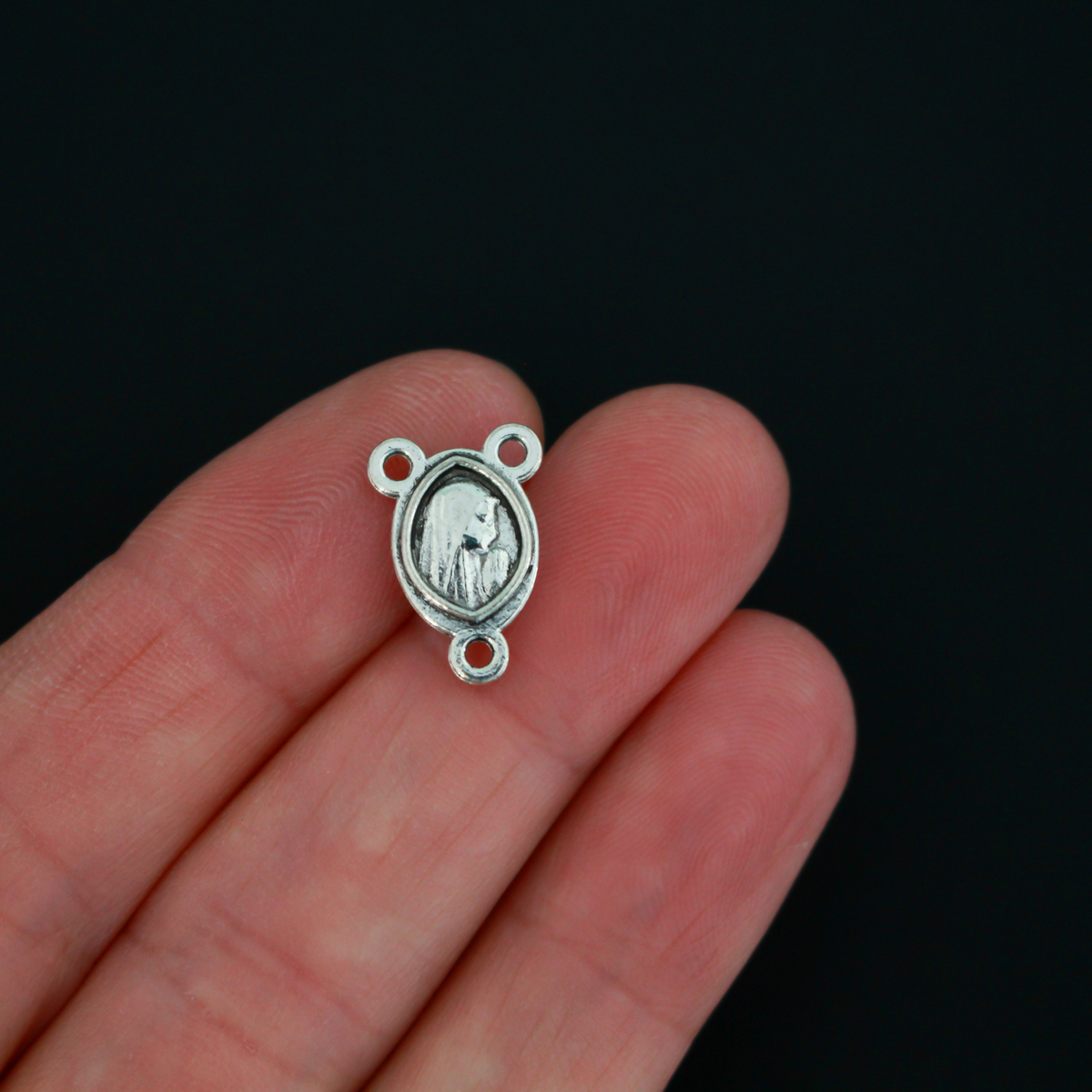 Tiny Our Lady of Fatima rosary centerpiece with the Blessed Virgin Mary on the backside