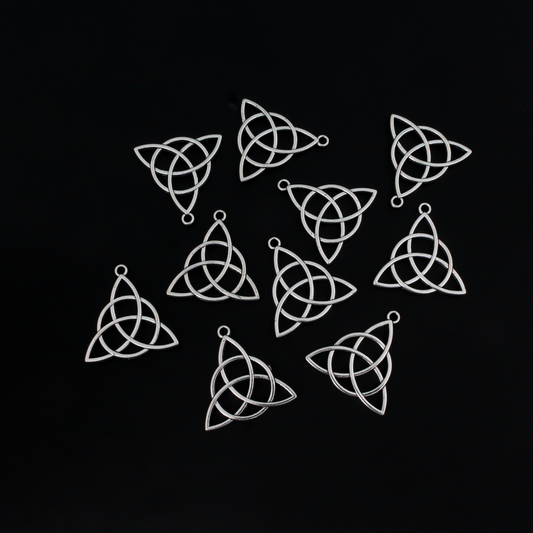 Celtic knot charms that are an antiqued silver tone color, 28.5mm long