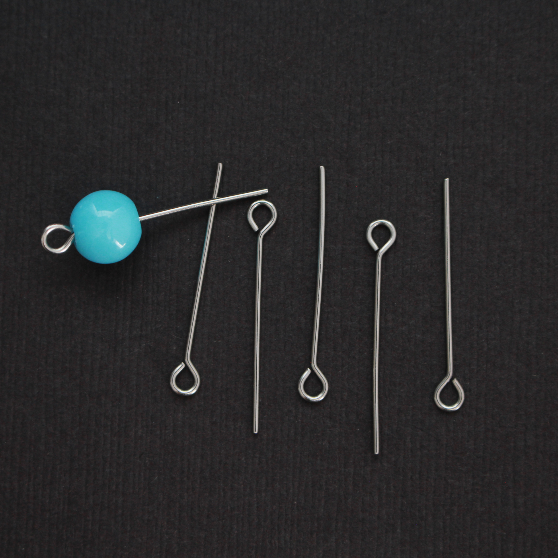 Solid stainless steel eye pins that are 25mm long