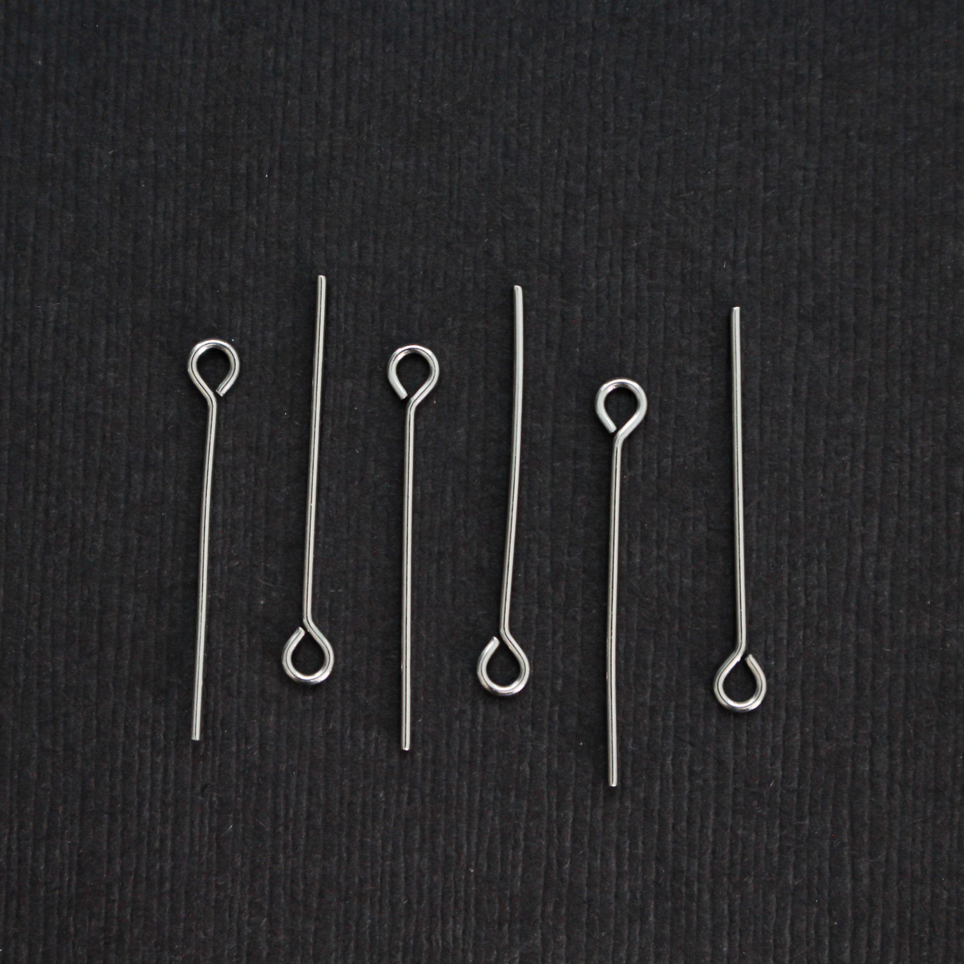Solid stainless steel eye pins that are 25mm long