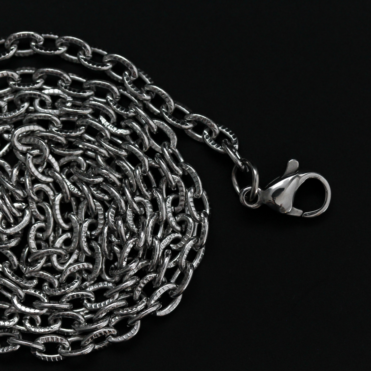 Stainless steel cable necklace chain with textured links and a lobster claw clasp, 50cm long