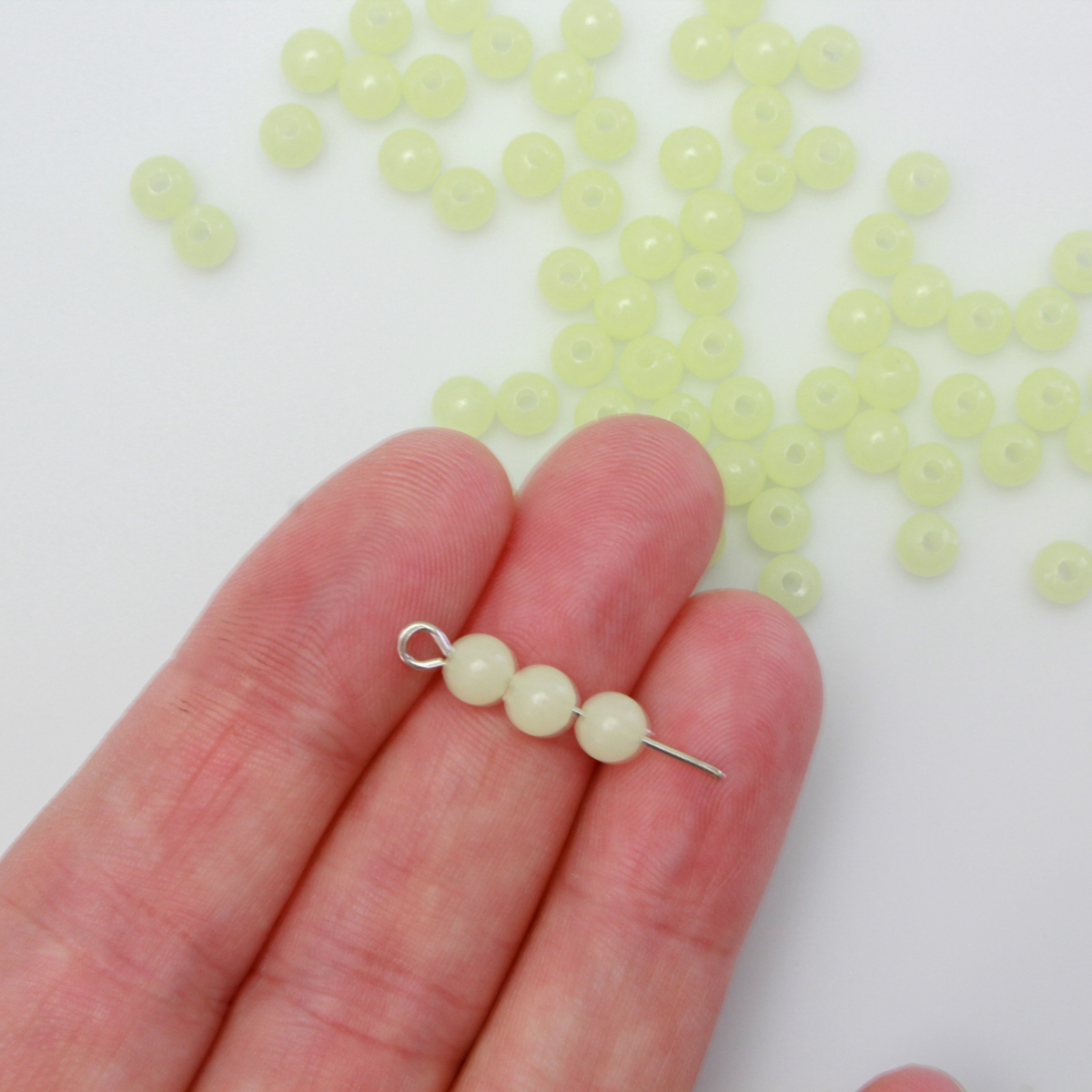 Luminous glow in the dark acrylic beads that are center drilled. They are a light pale green color when viewed in daylight. They glow green in the dark