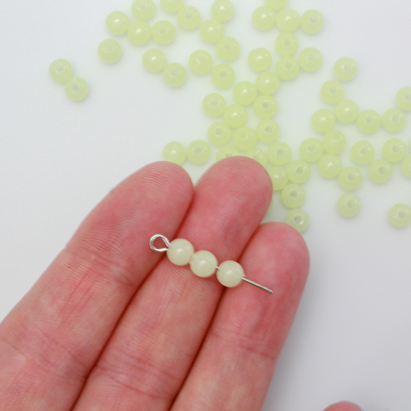 Luminous glow in the dark acrylic beads that are center drilled. They are a light pale green color when viewed in daylight. They glow green in the dark