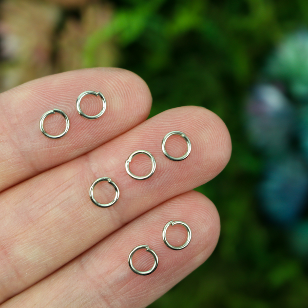 5mm silver-tone jump rings made from an iron-based alloy