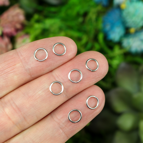 6mm round silver tone jump rings sold in packs of 100