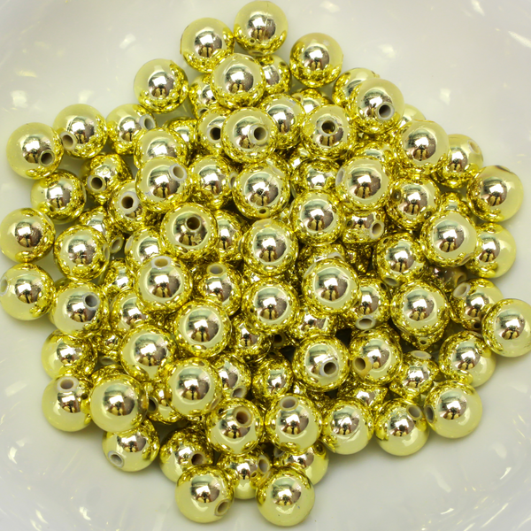 8mm round plastic beads with a gold metallic plating. 