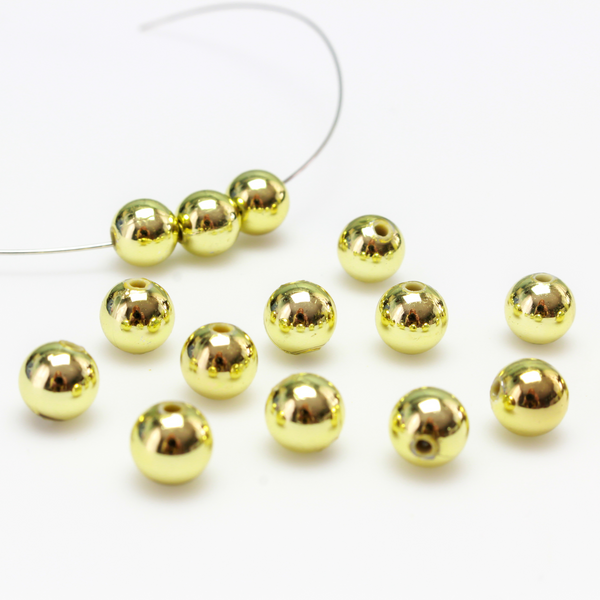 8mm round plastic beads with a gold metallic plating. 
