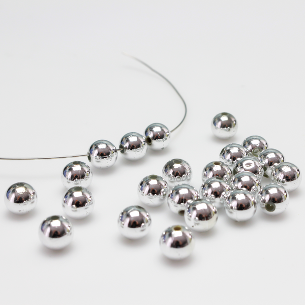 8mm round plastic beads with a shiny silver metallic plating. 