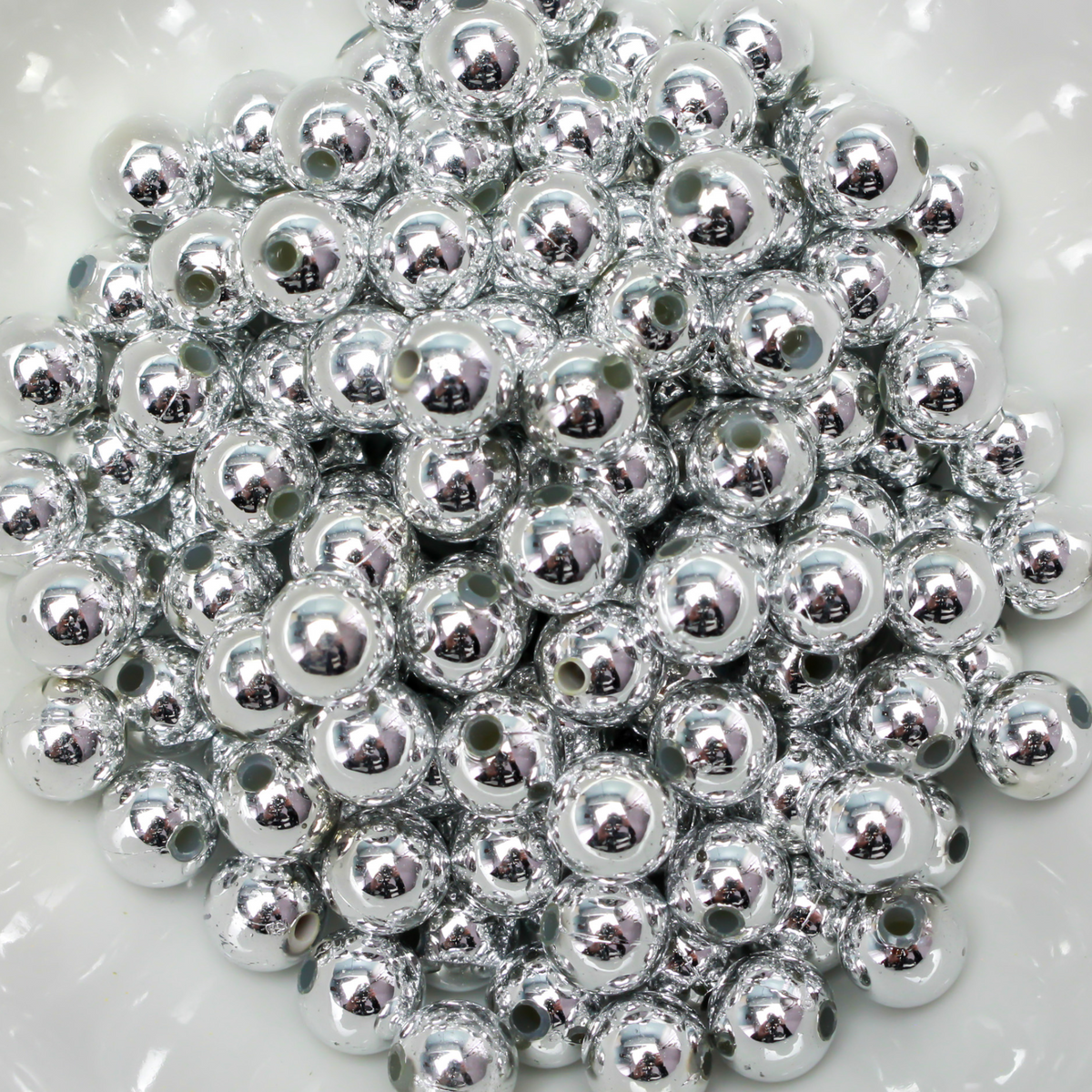 8mm round plastic beads with a shiny silver metallic plating. 