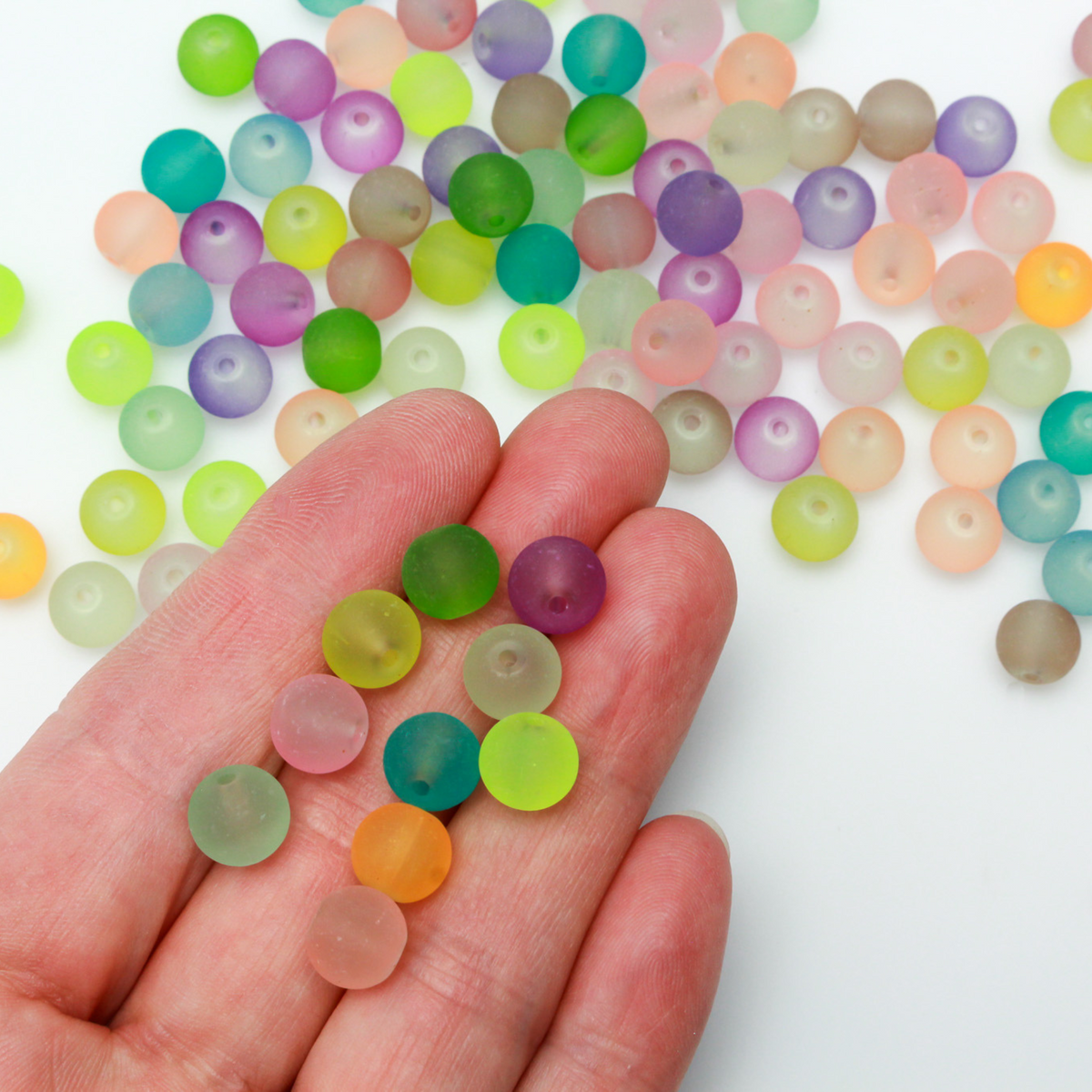 Transparent frosted glass beads in a random mix of colors, 8mm x 7mm