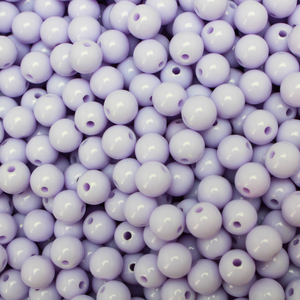 Round pale purple opaque beads that are 8mm in diameter with a 1.5mm hole size. 