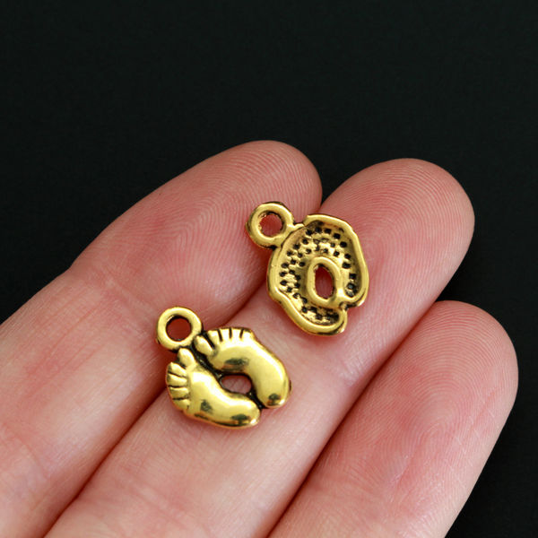 Gold baby feet charms for jewelry marking or craft projects, 14mm long
