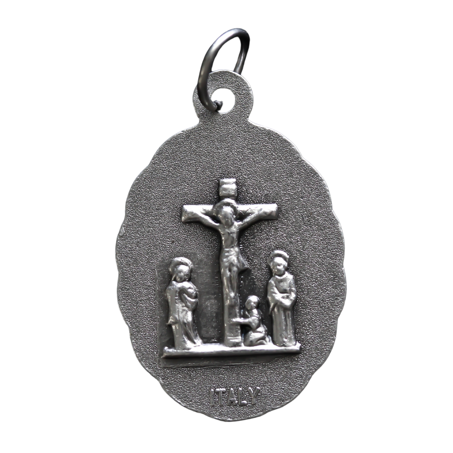 Our Lady of the Seven Sorrows medal that depicts the Virgin Mary on the front, her heart is pierced by seven swords which represent the seven sorrows.
