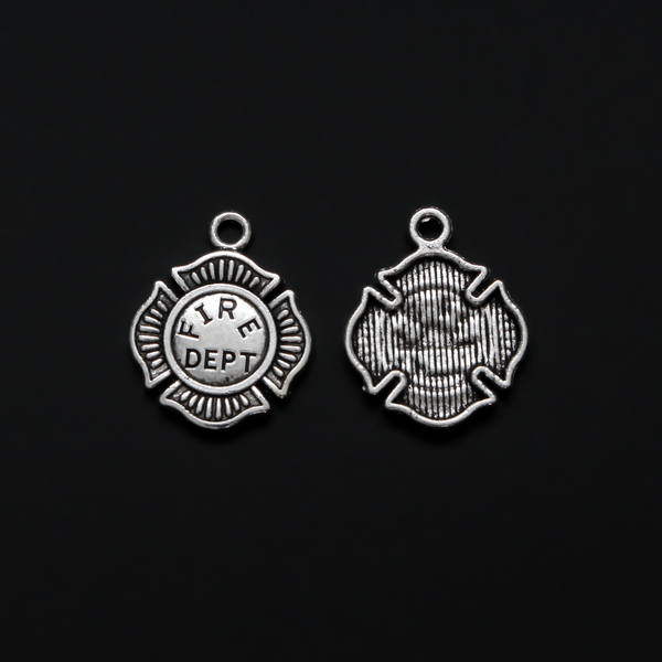 Small silver tone charms in the shape of the Maltese Cross and marked "FIRE DEPT" on the front.