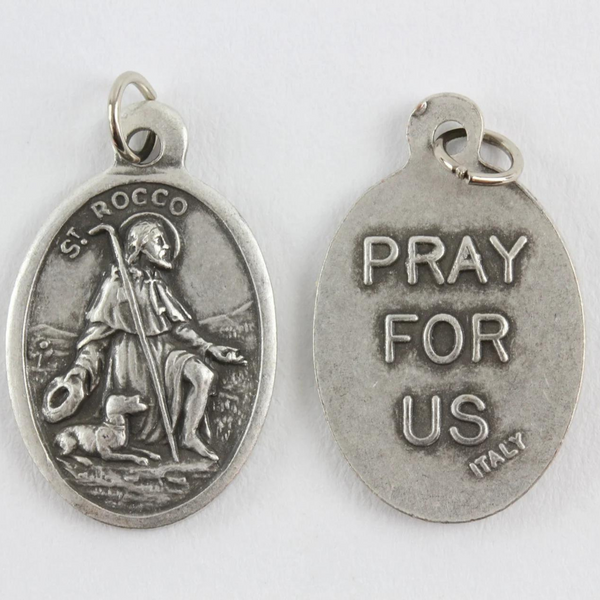 Saint Rocco (Roch) oval medal that depicts the saint on the front and "Pray For Us" on the back