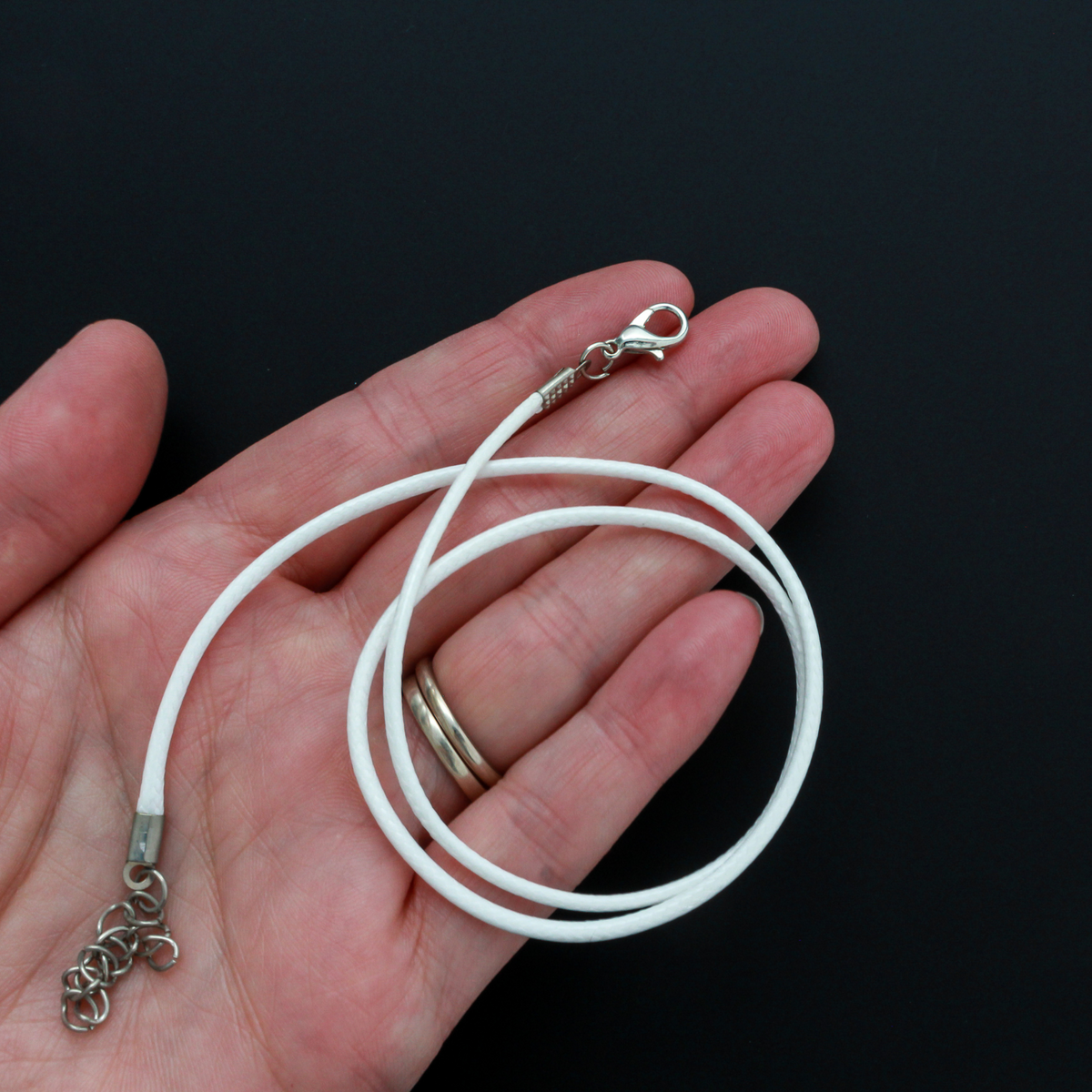 White wax cord necklace with a lobster clasp and extender chain