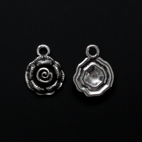 Small round rose charms in an antique silver tone color, 17mm long, 14mm wide, 5mm thick