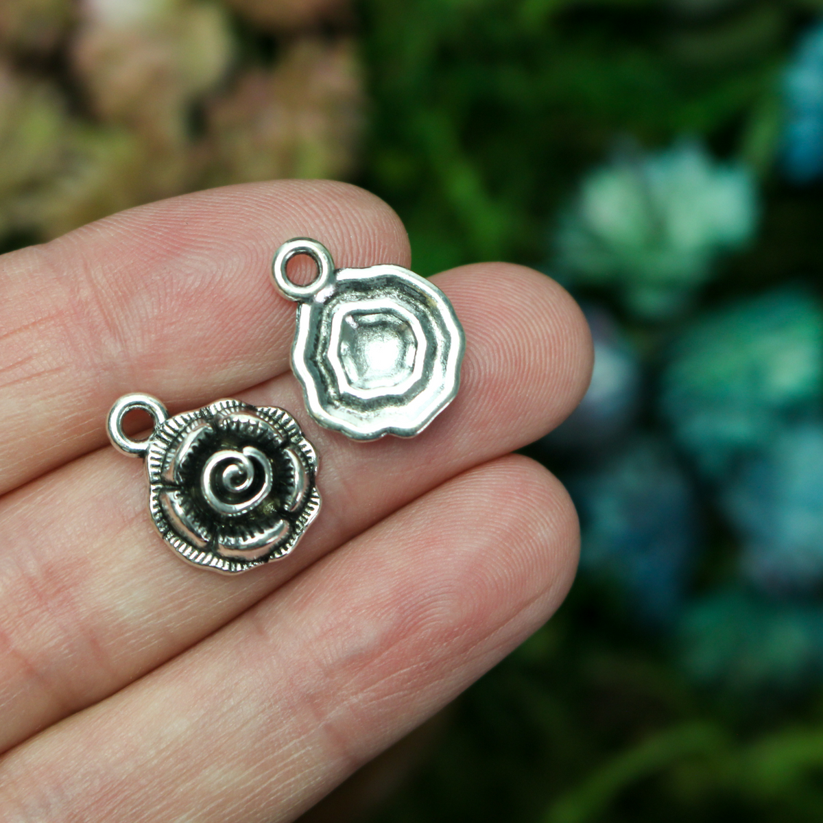 Small round rose charms in an antique silver tone color, 17mm long, 14mm wide, 5mm thick