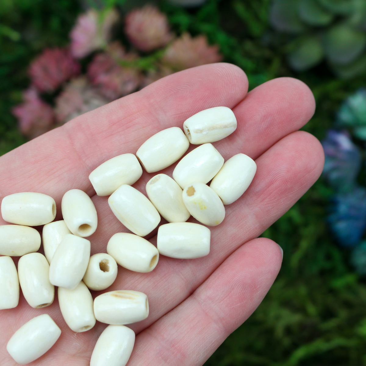  cylinder wooden beads that 12mm long by 8mm wide with 2.7mm hole