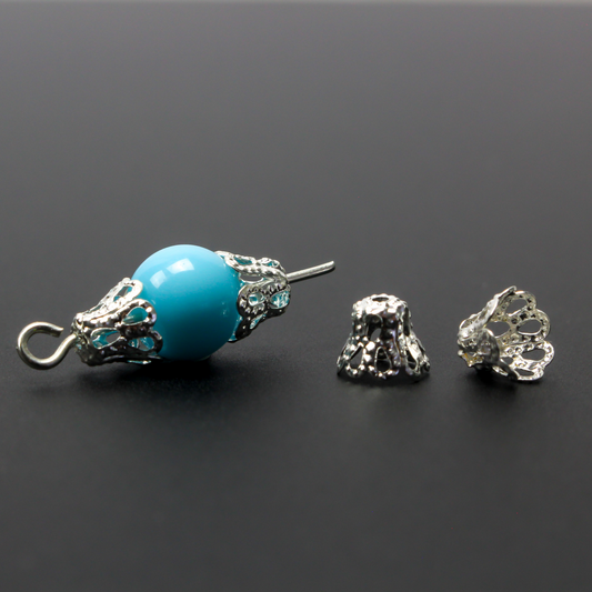 Filigree bead cap cups that are 5mm long by 6mm in diameter at the opening. They can fit beads 6mm - 8mm. Antique silver tone color