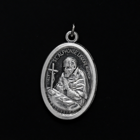 Saint Alphonsus Ligouri one inch oval medal. The front of the medal depicts the Saint and the reverse is marked "Pray For Us"