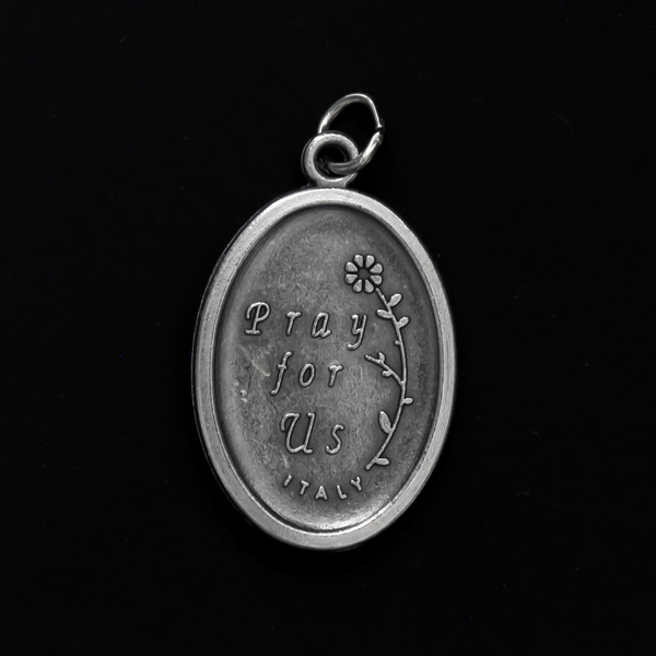Saint Alphonsus Ligouri one inch oval medal. The front of the medal depicts the Saint and the reverse is marked "Pray For Us"