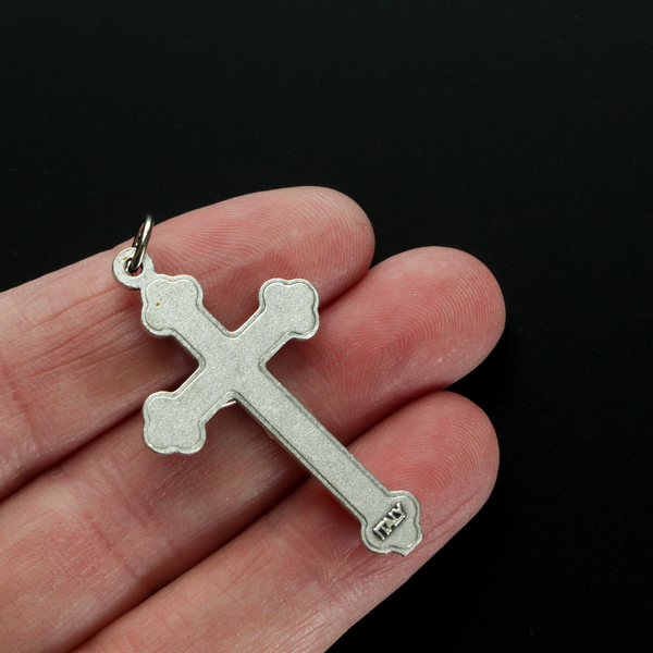 Orthodox Byzantine die-cast metal crucifix with a vibrant red enamel inlay