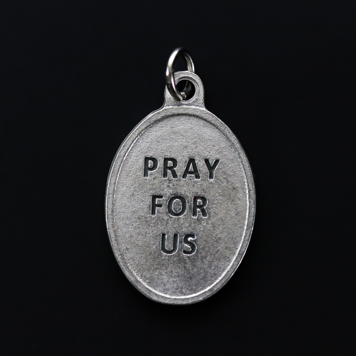 Saint Robert Bellarmine medal that depicts the saint on the front and is marked "Pray For Us" on the back.