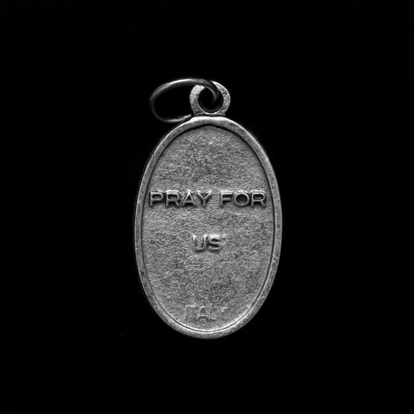 Saints Cosmas and Damian oval medal that depicts the brothers on the front and "Pray For Us" on the back