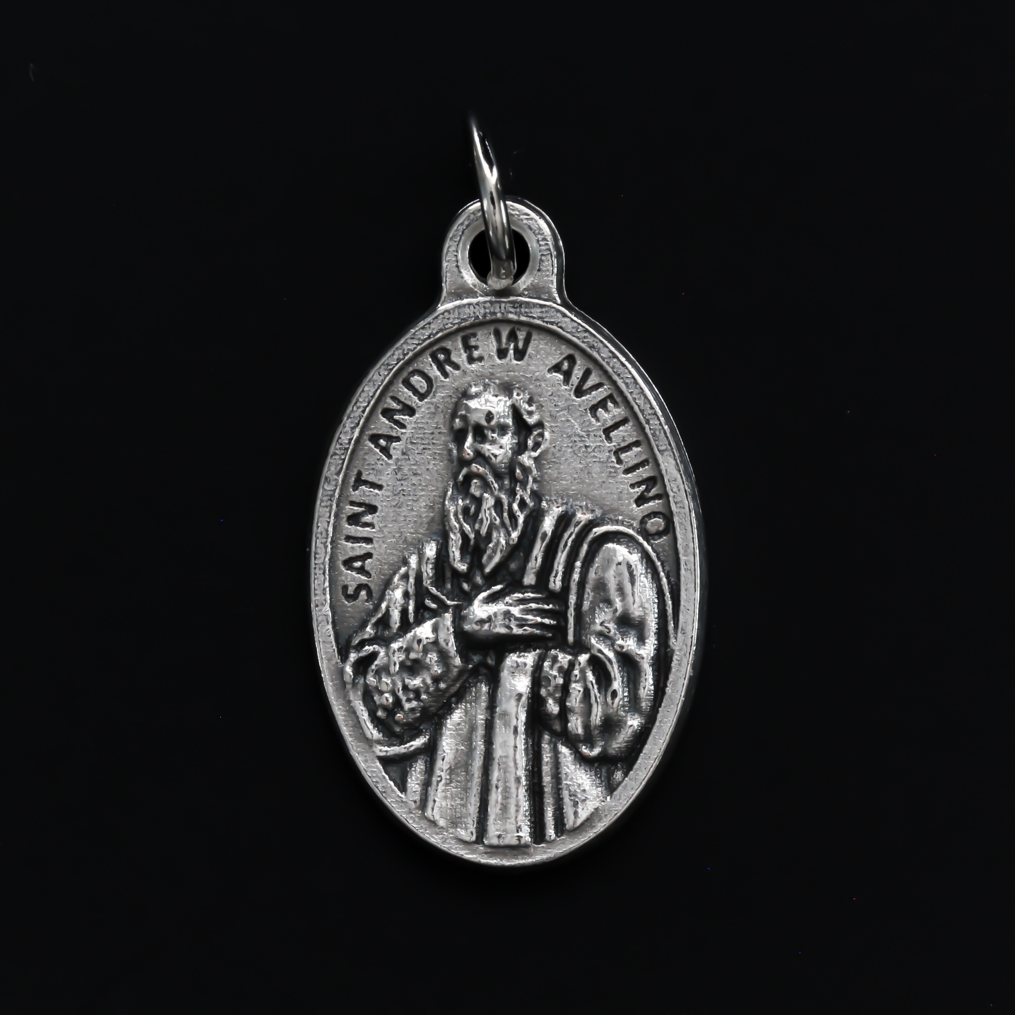 Saint Andrew Avellino medal that depicts the saint on the front and the reverse side is marked "Pray For Us"