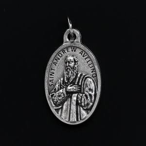 Saint Andrew Avellino medal that depicts the saint on the front and the reverse side is marked "Pray For Us"