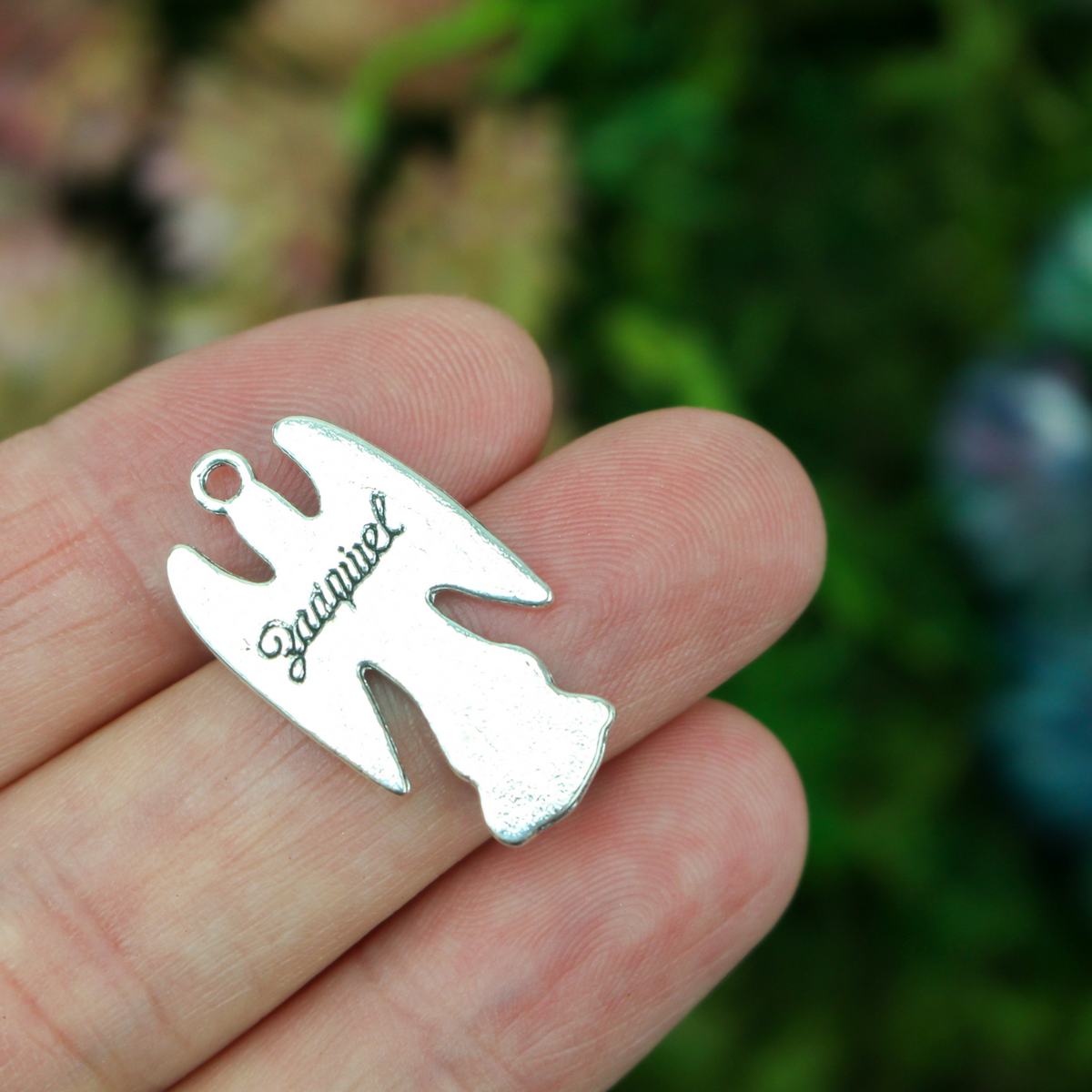 Archangel Zadkiel silver tone charm with his name on the backside inscribed in cursive
