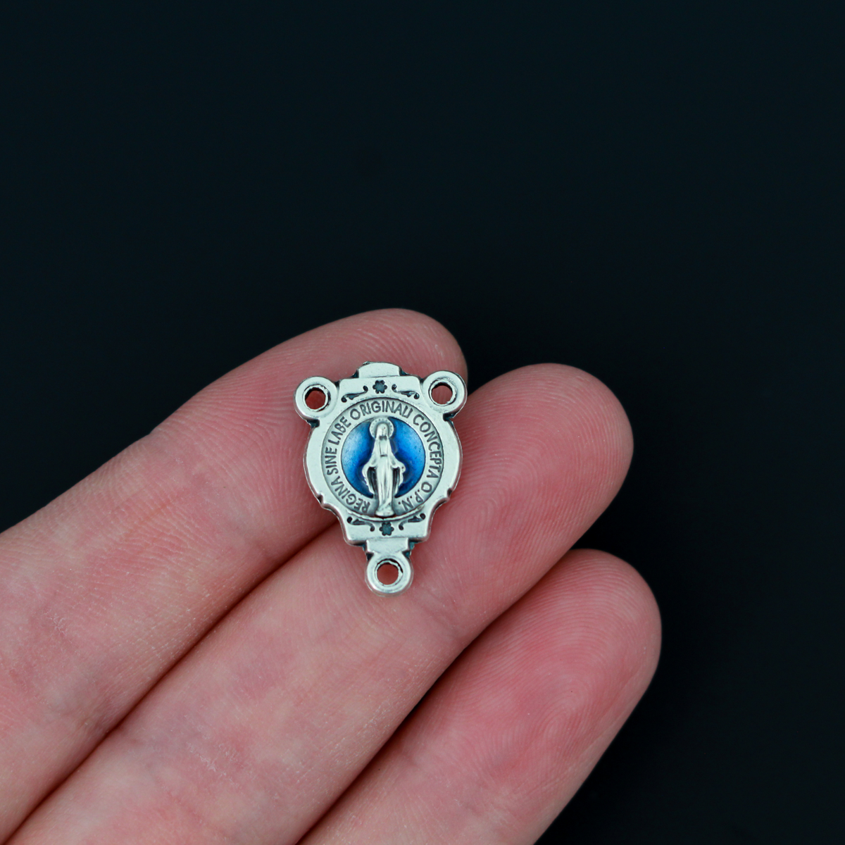 Miraculous Medal rosary centerpiece that has blue enamel detailing on the front side only.