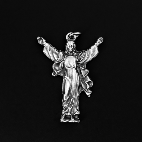 Exceptionally detailed die-cast silhouette medal featuring the Risen Christ, the Redeemer, 1.5 inches long