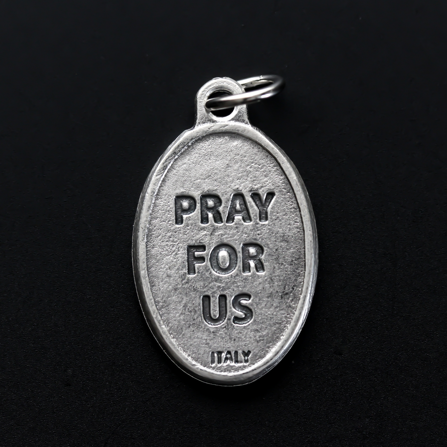 Edith Stein, also known as, Saint Teresa Benedicta of the Cross medal that depicts the saint on the front and marked "Pray For Us" on the backside