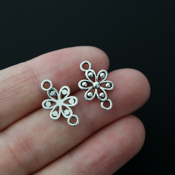 Daisy flower connector links in an antique silver tone color, 17mm long