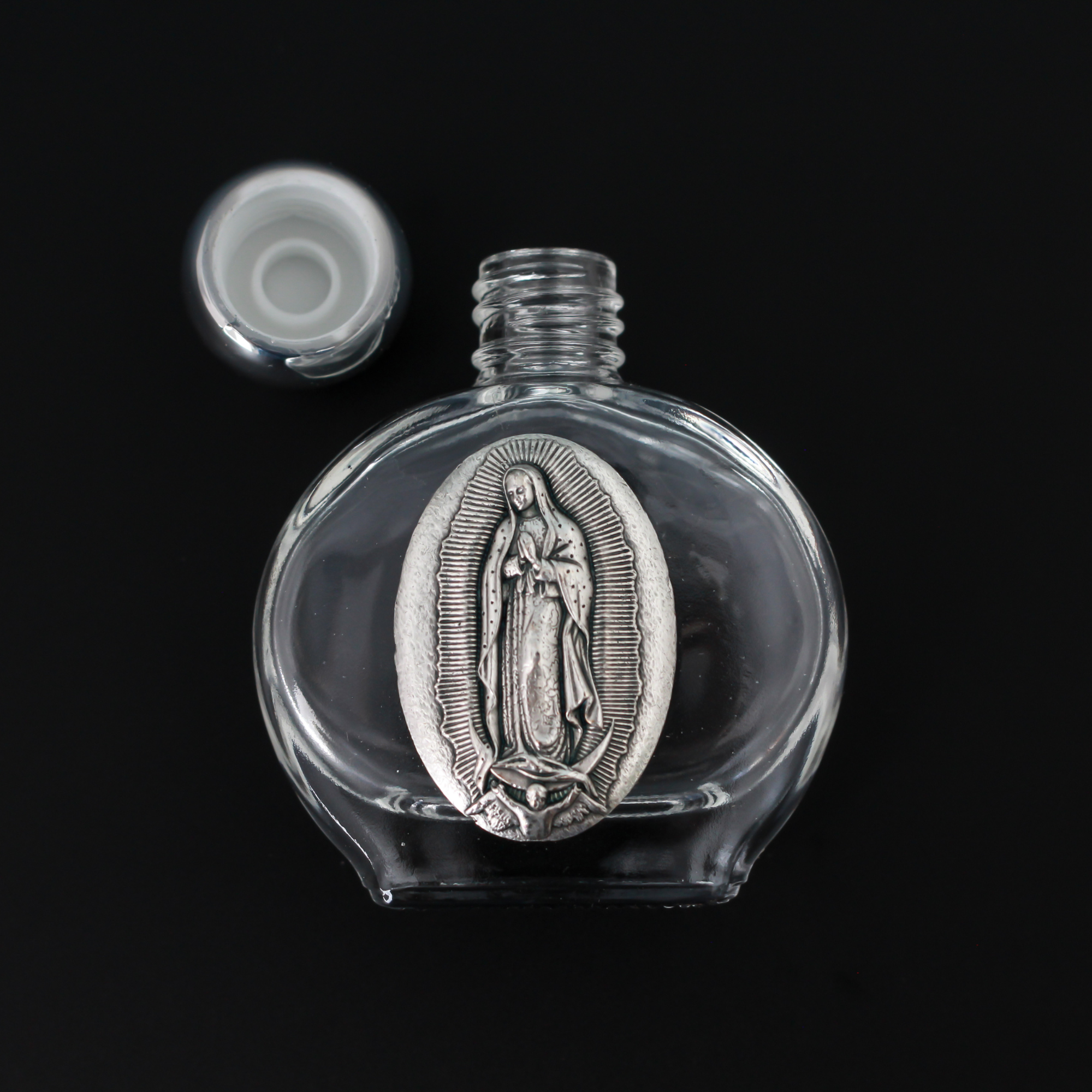 https://www.smalldevotions.com/cdn/shop/products/Guadalupe_holy_water_bottle_3_1024x1024@2x.png?v=1681931896