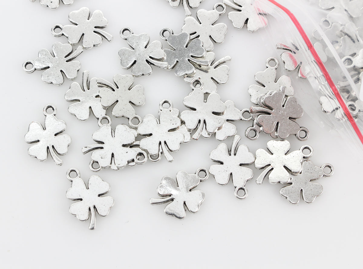 silver tone four leaf clover charm pendants