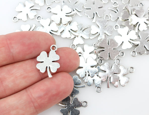 silver tone four leaf clover charm pendants