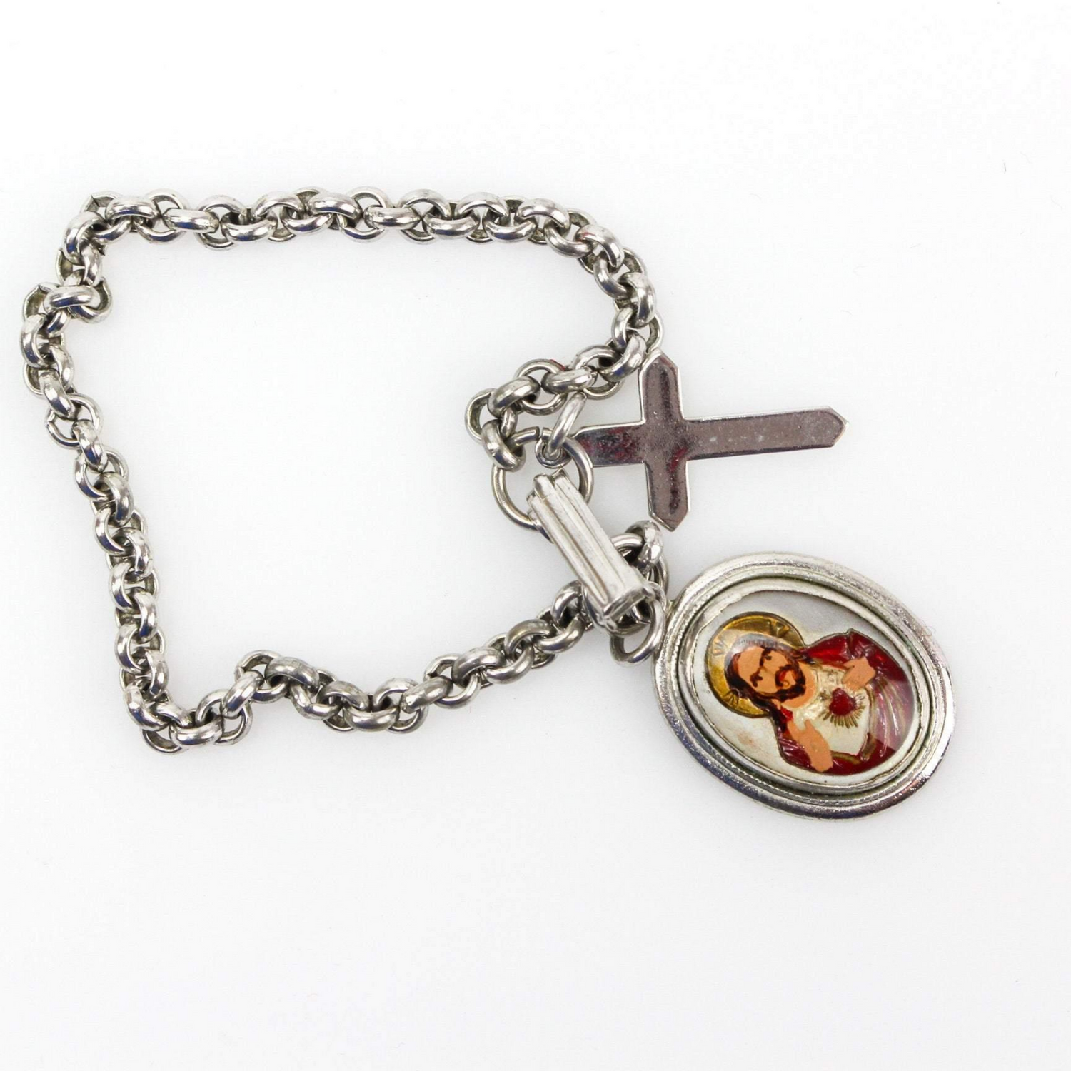 Intaglio Bubble Glass Reverse Painted Pendant of the sacred heart of jesus