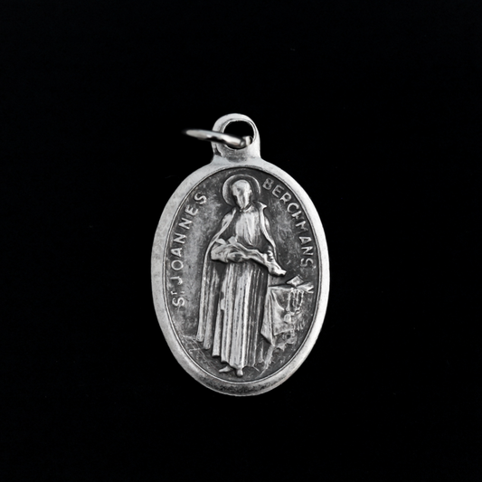 Saint John Berchmans medal. The front depicts the saint and the reverse is marked "Pray For Us".