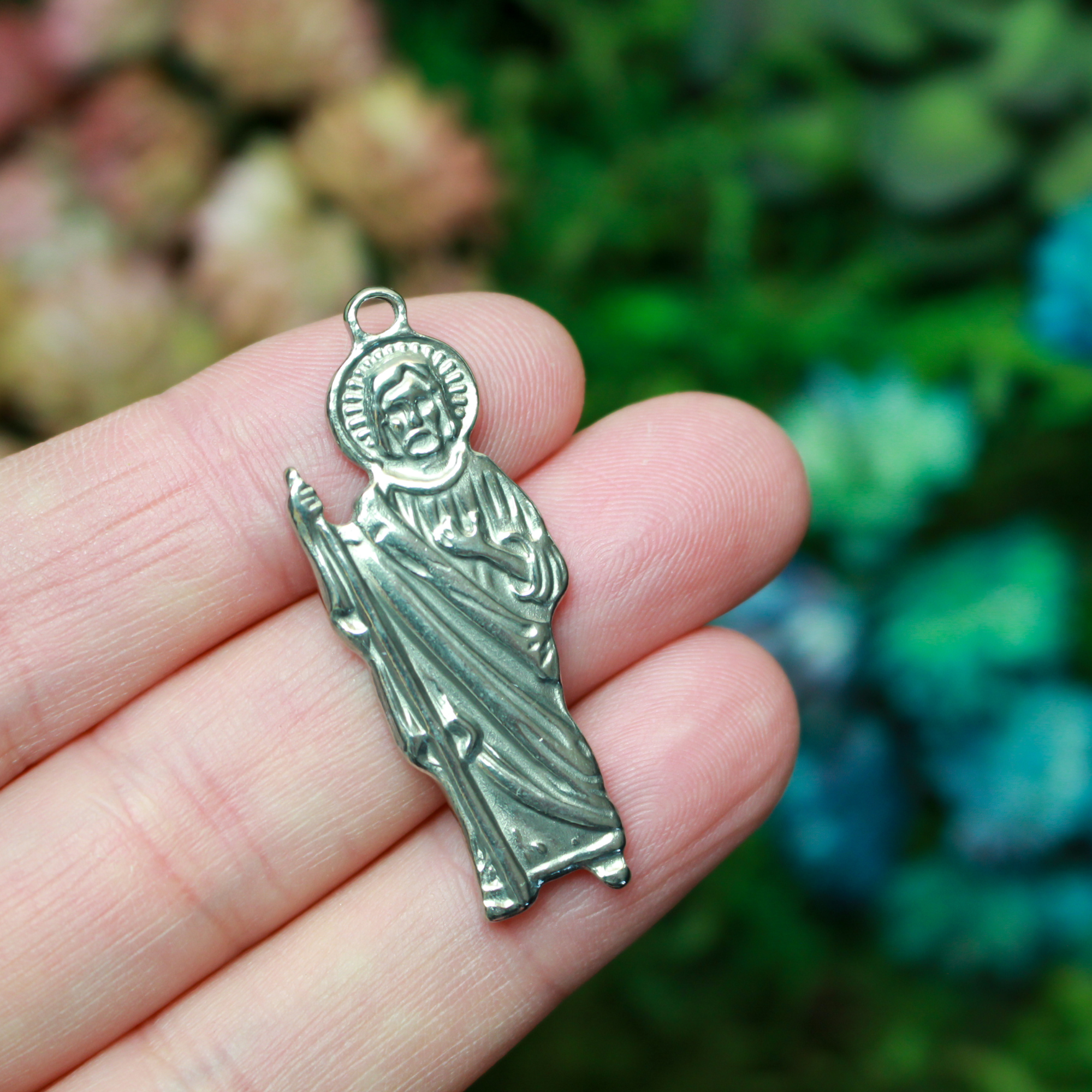Jesus Christ figural charm pendant that depicts Jesus as the Good Shepherd holding a shepherd's staff., 1.5" long